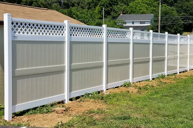 Unique-Fence-home-2 A Unique custom 2 tone vinyl privacy fence